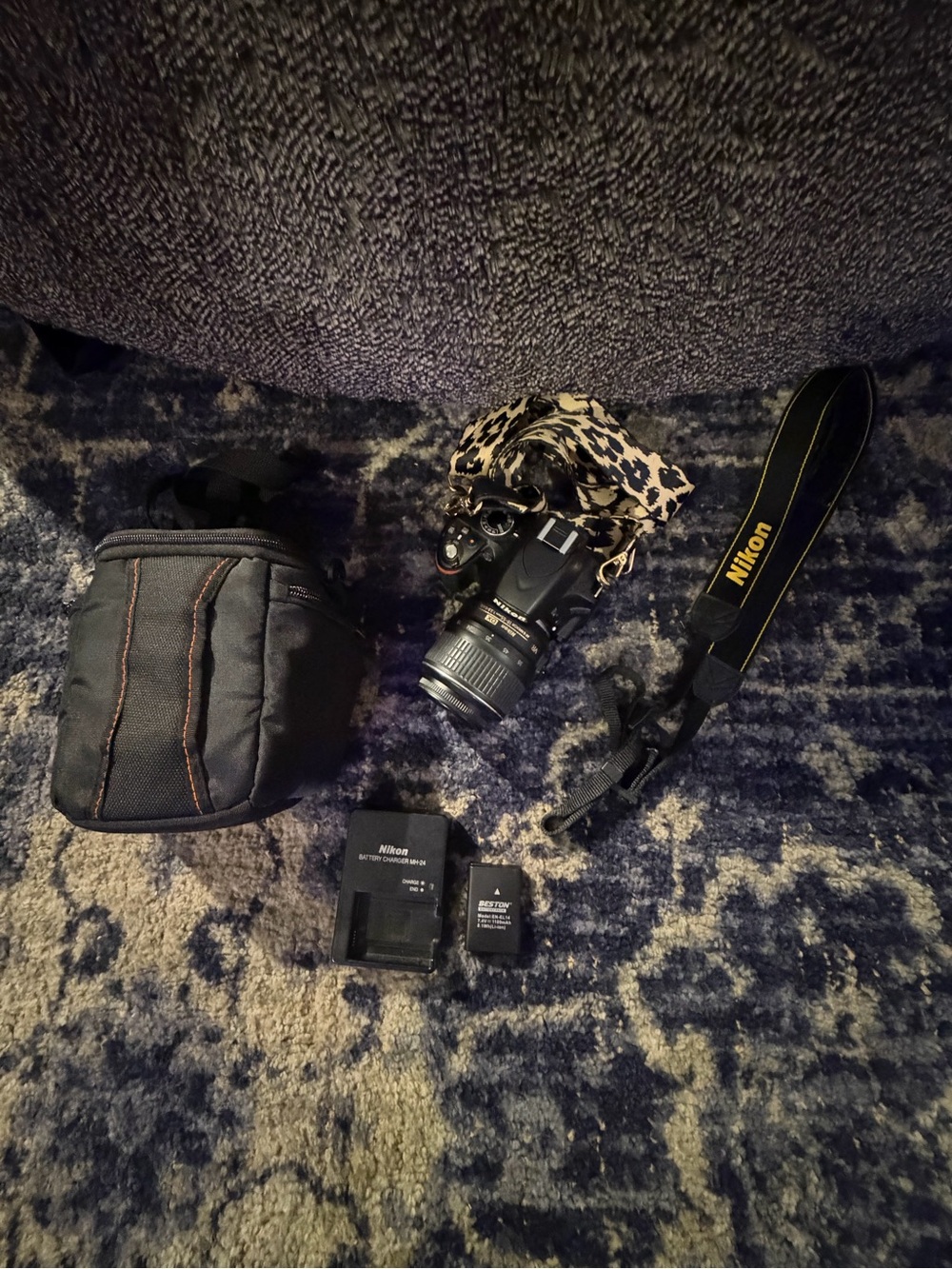 Nikon Black Camera with Yellow-Trim Strap and Leopard Accent